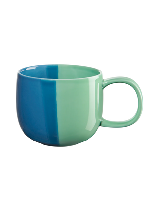 Two-tone blue and green mug on a white background