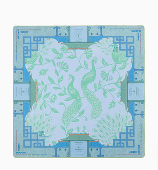 Decorative gameboard with peacock design on a light blue background