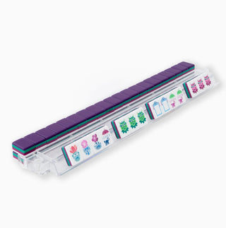 Roll of purple tape with colorful labels on a white background
